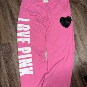 Y2K vintage Victoria's Secret PINK wide-leg sweatpants.